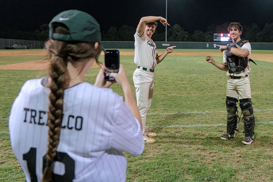 Taking a picture for her instagram story, Senior Grace Trebilco gets baseball players Luke OMalley and Christain Gamez to pose in front of the score board after winning a game. Trebilco served as baseball manager all four years of her high school career, doing statistics and other jobs for the team. “At the beginning, I had a very basic understanding of baseball and how baseball works, then all of a sudden people were balking and I was like ‘what is that,’” Trebilco said. “But, I grew up with the seniors on the team, and they helped me a lot. We’re just really happy for each others successes, which goes back to their team motto of Mudita, which I’m really happy I got to be a part of and included in as well.”
Photo Courtsey of Jim Cowlishaw