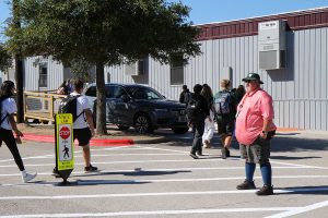 During passing period, parking lot security Alan Gallagher stands on the street between the portables and the main building, ensuring students get to the other side safely. Everyday, Gallagher monitors the parking lots, checks parking permits and helps guide traffic, even more so now with the addition of the portables. “I spend a lot of time making sure students and staff get across the walkway,” Gallagher said. “I haven’t had any real problems [with students] yet, it’s just about getting people adjusted to the new traffic patterns.”