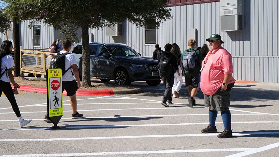 During passing period, parking lot security Alan Gallagher stands on the street between the portables and the main building, ensuring students get to the other side safely. Everyday, Gallagher monitors the parking lots, checks parking permits and helps guide traffic, even more so now with the addition of the portables. “I spend a lot of time making sure students and staff get across the walkway,” Gallagher said. “I haven’t had any real problems [with students] yet, it’s just about getting people adjusted to the new traffic patterns.”