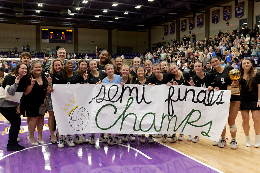 Posing with the gold ball trophy, the varsity volleyball team takes a picture after advancing to the UIL State Championship Title game. The team beat Georgetown 3-1 at The University of Mary Hardin Baylor on Nov. 19. “I couldn’t be more proud of the kids and everybody behind the scenes,” head coach Lori McLaughlin said. “Georgetown is an amazing team, so this is a hard win. We just continue to be fueled by our wins and the motivation we have to keep our season going.” Photo by Alyssa Fox