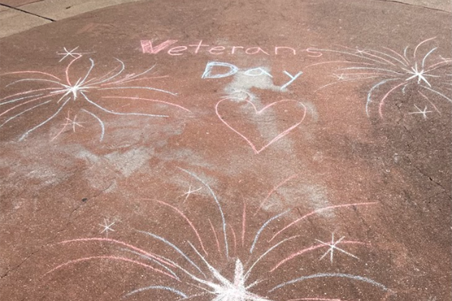 Students drew chalk art in honor of Veterans day. This is just one of many things the school does to show appreciation to veterans, and the art will remain in the courtyard as a reminder of all of the veterans who served their country. “On veteran’s day, I think it’s a great thing we do at school to honor people that served [who are] at our school or family members,” English teacher and cheer coach Nadira King said. “It makes me feel proud, and it makes me remember the [veterans].”