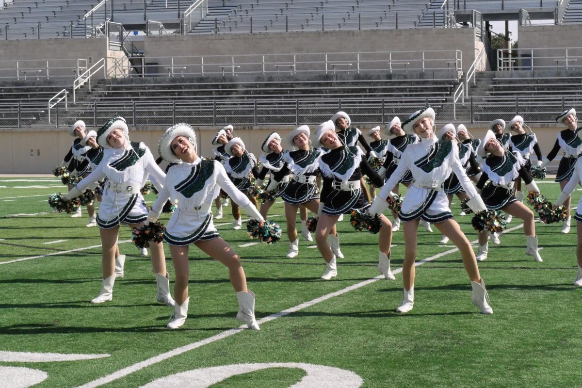 The Celebrities dance team showcases their performance to "Lips are Movin'" on the field of Gupton Stadium on Nov. 13. The dancers competed in the Texas Dance Education Association’s Dance/Drill Team​ Fall Assessment and earned a Division One ranking. "Celebs is definitely worth all the hard work," senior Sofia De Leon said. "It's very fun, has good performances and I love it every single year, despite the fact that it is mentally challenging sometimes, it's all worth it overall."
 