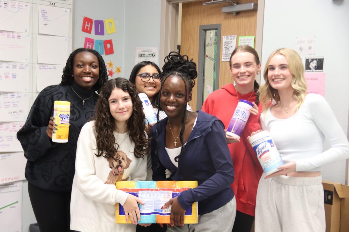 Holding sanitizing wipes, the HOSA MRC team prepares to clean Mrs. Hert’s classroom. Dedicated to educating the community about various public health issues, this student led group spreads awareness by cleaning desks and doorknobs of classrooms to encourage cleanliness and prevent germs and the spread of the flu. “Spreading information to our community will make them better prepared in emergencies,” senior Emlee Yonga said. “It’s important to me that the student body is knowledgeable of how to stay healthy to keep themselves and others safe. Healthy lifestyles are overall very beneficial as they can lead to a better quality of life and improve mental health.”