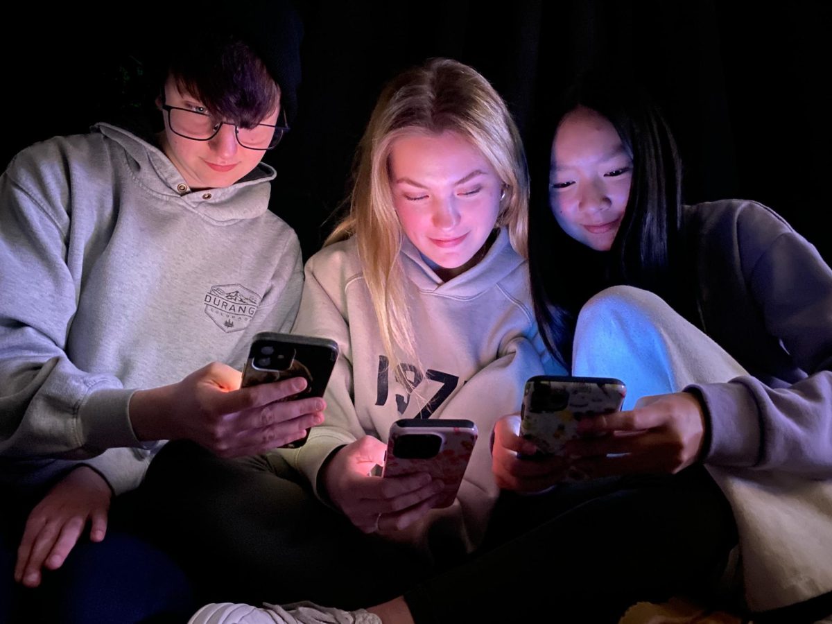 A group of students sit with their phones in hand, TikTok's scrolling feed illuminating their faces. In an executive order signed on Jan. 20, United States President Donald Trump ordered the Department of Justice to refrain from enforcing an Act to control foreign-owned apps, such as TikTok, for 75 days. “Americans deserve to see our exciting Inauguration, as well as other events and conversations,” Trump said in a Truth Social post. “Without U.S. approval, there is no TikTok. With our approval, it is worth hundreds of billions of dollars - maybe trillions."