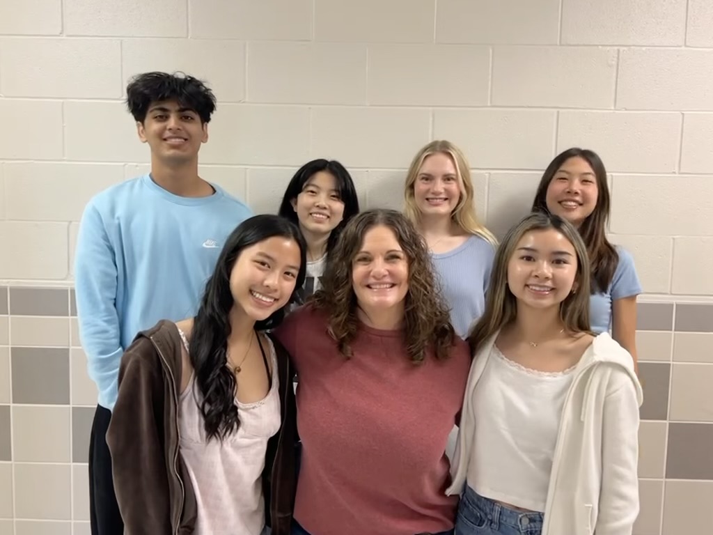 Senior Rushil Mehta, Junior Katie Liu, Senior Ashley Blair, Senior Anabelle Staples, Senior Jen Nguyen, teacher Amy Buffington, and Senior Kim Dao smile at the camera as they anticipate the upcoming HOSA competition. These students are working together in their Mental Health Campaign, and they have made various preparations for the competition. “We did lots of outreach activities, such as a gratitude jar for students on CPHS and Christmas stockings for children who have to stay at a hospital during the holiday season,” Liu said. “We hoped that it would alleviate anxiety in youth and help brighten their day.” Photo courtesy of Payton DeAngelis
