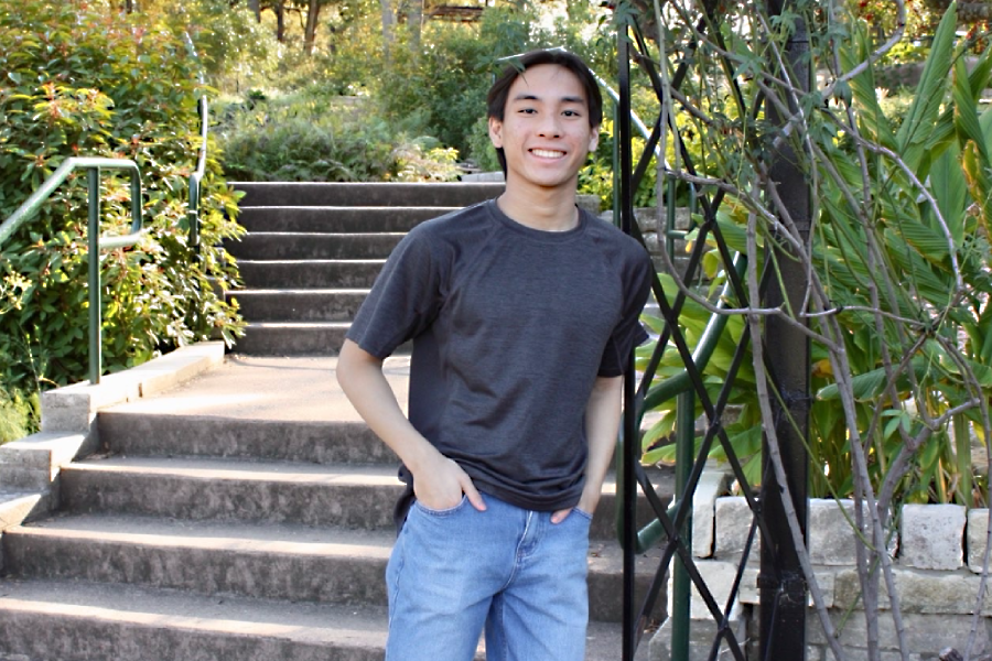 Standing near the trees, senior Parker Huang poses for a senior picture. Huang was a member of the swim team, a math tutor and UIL Academics district champion in four different events. “I'm sure that I will look back on this time fondly,” Huang said. “And the people I met, the experiences I had, the ups and downs, they've made me the person I am today.” Photo courtesy of Joy Huang