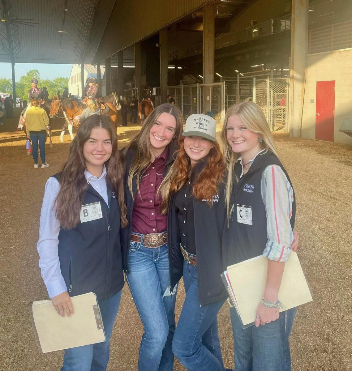 Smiling at the camera, sophomores Audree Hearnsburger, Haley Evans, Emma McDougal, and junior Lucy Wigert pose for a picture after qualifying for state CDEs in their first year as a team. The girls competed on May 3 and placed 38th overall out of over 80 schools. “Making it to state was such a game changer,” sophomore Haley Evans said. “I’m so proud of us. I’ve never made it to state for anything, so I was really proud of both me and the girls. No matter how we did, I’m just super proud of us for making it to state.” 
Photo courtesy of CPHS FFA