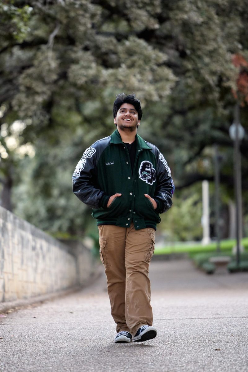 Senior Krish Muthukumar walks ahead on a pathway and said he's excited for the aspiration of what's to come. He spent four years in the school choir and theater programs, where he found his passion for performing. “I've spent so many hours in practice and rehearsal, but it's all been worth it,” Muthukumar said. “The most rewarding part is being able to tell a story through music and performance, and I'm excited to see where it takes me next.” Photo courtesy of Danielle Walker.