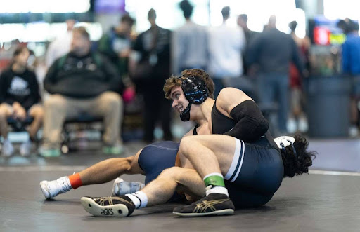 Holding his opponent to the mat, senior Max Brandt wrestles through the semifinals at Doc Hess, placing first. Brandt has been wrestling for 14 years and after qualifying for state sophomore and junior year he placed third in the 2025 UIL Boys State Championship . “Stepping onto the mat at state, I tried to remember to stick to my good stuff and don’t try new things,” Brandt said. “I had to remember to use the tools and moves I’ve practiced since I was four and I know I can do perfectly. Winning my last match at state, it didn't hit me that I just wrestled my final high school match, but I was happy I ended my high school career with a victory.” Photo courtesy of Max Brandt
