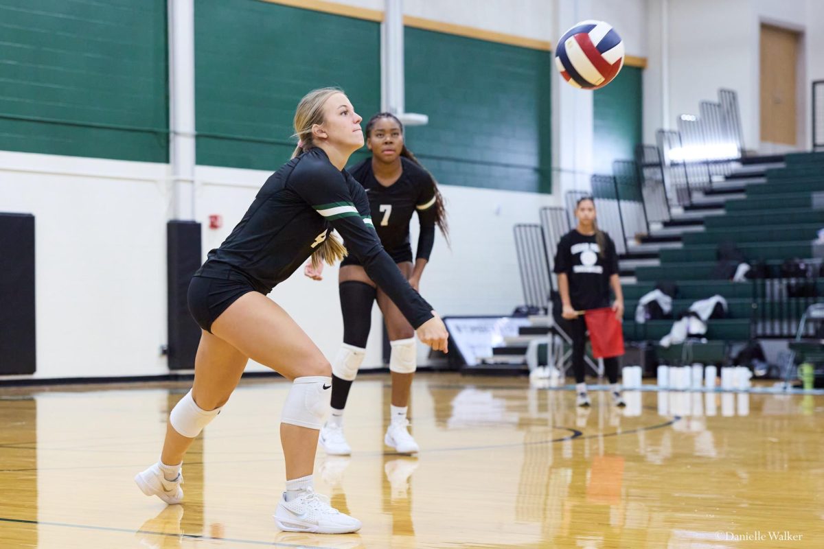 With her eyes focused on the volleyball, senior setter Sibley Oster prepares to hit the ball to her teammates. Oster, along with three other seniors on the varsity volleyball team, has committed to a Division I college program for next season. “I’m really excited to experience a new level of volleyball and compete at that high level,” Oster said. “Off the court, I’m ready for the adventure of being in a new place, away from home and surrounded by something new.”
Photo courtesy of Danielle Walker