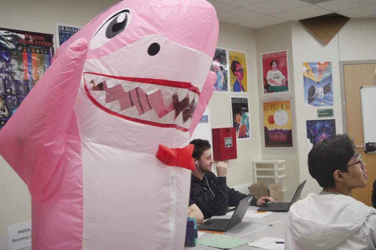 Dancing her way into a class, sophomore student council member Robin Han hypes students up in a blow-up costume while delivering a Valentine gram. Student council members signed up two weeks in advance to deliver these grams across school today during second and third period. “Honestly, at first it was a little bit embarrassing, because I felt everybody looking at me, but later on, I embraced it,” Han said. “It was more fun going into classrooms, especially with people I know in the classrooms or my friends. That was really great seeing their reactions and getting to high five or wave to them.”